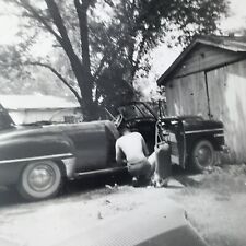 Vintage 1954 Black and White Photo Man Vacuuming Car Floor Vacuum Driveway picture
