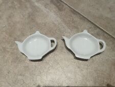 2 tea pot tea bag holders. picture